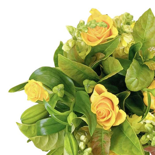 Citrus Sunshine Flower Bouquet close-up—yellow roses, lilies and snapdragons with lush greens | Flower Guy