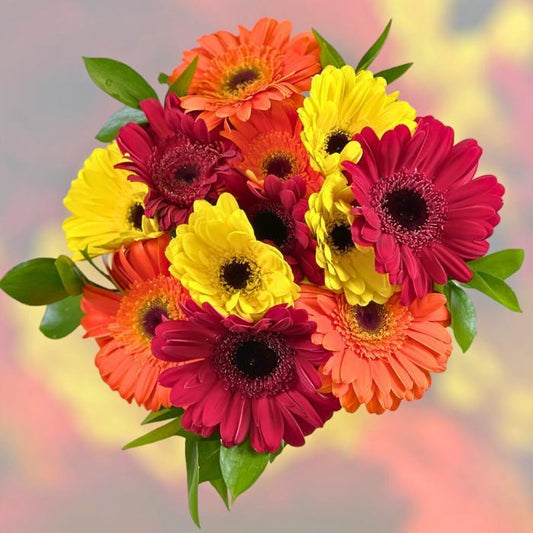 Hand holding a stunning orange Gerbera Daisy Flower Bouquet - Flower Guy