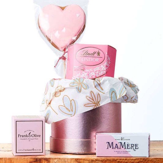 Love and Delight gift box set—pink-themed sweet treats and biscuits arranged for gifting | Flower Guy