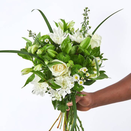 Elegant Mint Swirl Bouquet with lush white blooms and green accents, perfect for weddings, anniversaries, or heartfelt gifting.