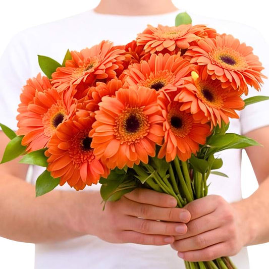 Orangina Blossom Gerbera Bouquet close-up—bright orange gerberas in a full hand-tied bunch, gift-ready | Flower Guy