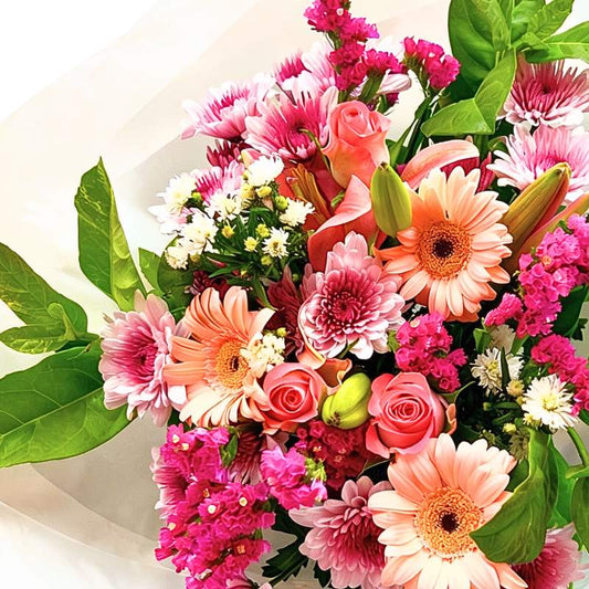 You've Got This Bouquet close-up—soft pink blooms and fresh greenery in gift-ready wrap | Flower Guy