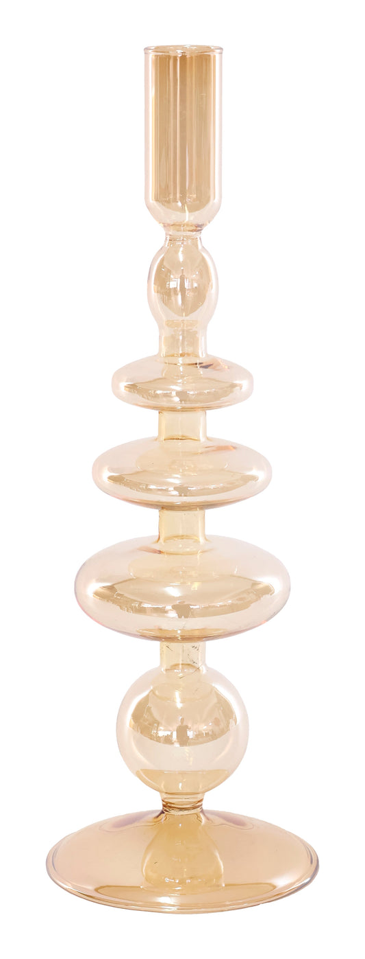 Decorative candle holder with a gold finish on a white background