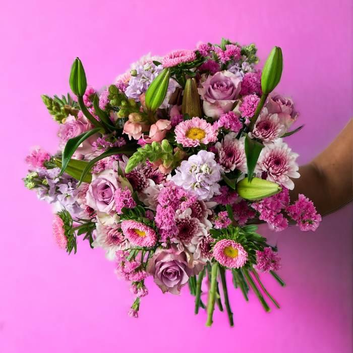 Barbie-themed bouquet with radiant pink flowers - Flower Guy