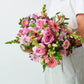 Lush bouquet with varying shades of Barbie pink - Flower Guy