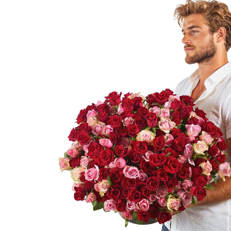 Big Feelings bouquet—man holding an oversized arrangement of red and pink roses, luxury gift delivery | Flower Guy