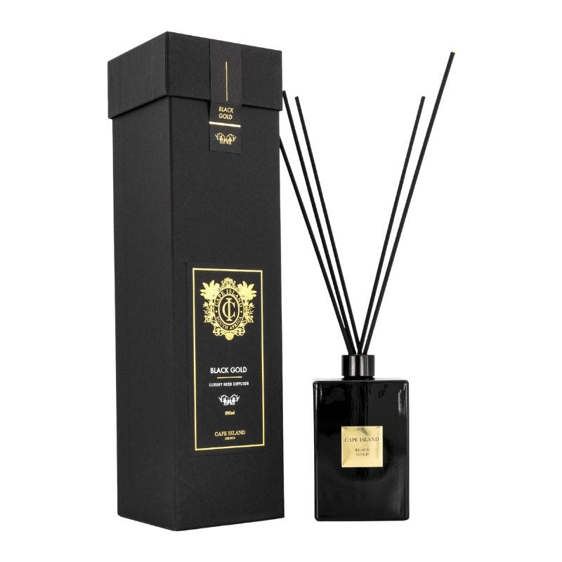Black Gold 500ml Diffuser - Flower Guy: luxury Cape Island reed diffuser with black gift box and gold emblem.