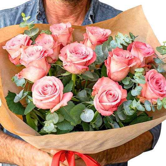 Blush Harmony rose bouquet close-up—soft pink roses and greenery in kraft wrap with ribbon, gift-ready | Flower Guy