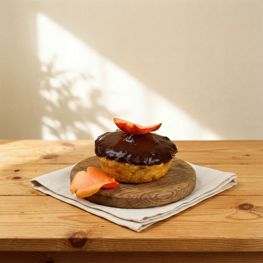 Gluten-free chocolate orange cake with dark glaze and orange petal by Flower Guy Cape Town