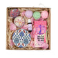 Thoughtful gifts for women with Flower Guy; this gift box include bath bombs and candles for a relaxing bath