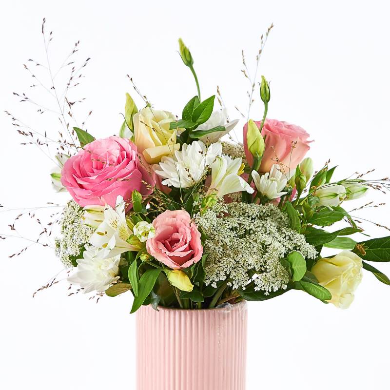 Dear Heart flower arrangement close-up in a modern pink vase with blush roses, white florals and soft greenery | Flower Guy