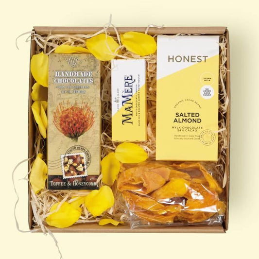 Snack hamper gift for men with chocolate, nougat and dried mango slices couriered nationwide by Flower Guy