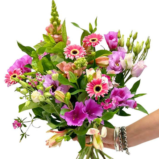 Believe in You Bouquet—pink and purple blooms with mini gerberas and snapdragons, hand-tied and wrapped | Flower Guy