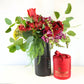 Luxurious red and green floral arrangement with Wedgewood Nougat - Metropolitan Bloom | Flower Guy