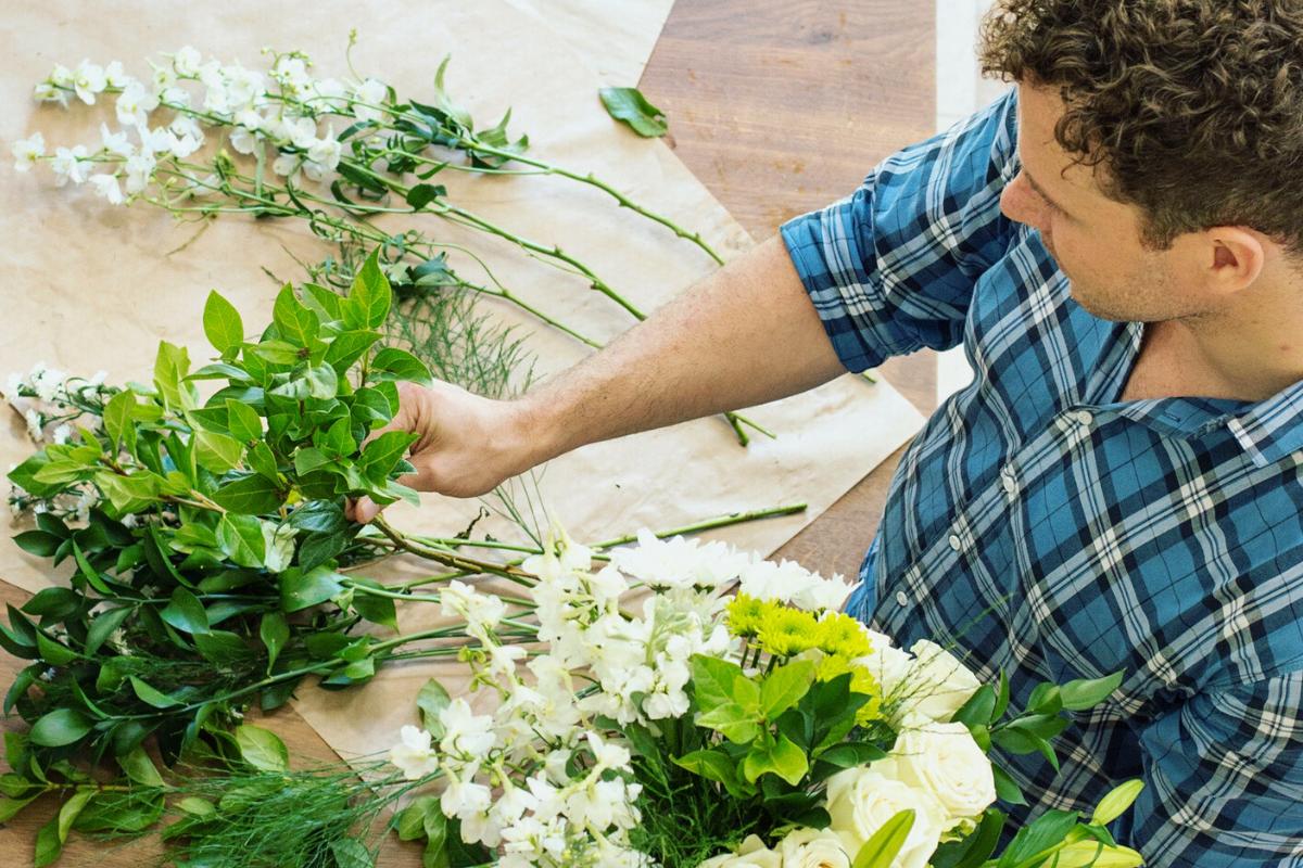 Image of Nicholas James the Flower Guy arranging fresh flowers