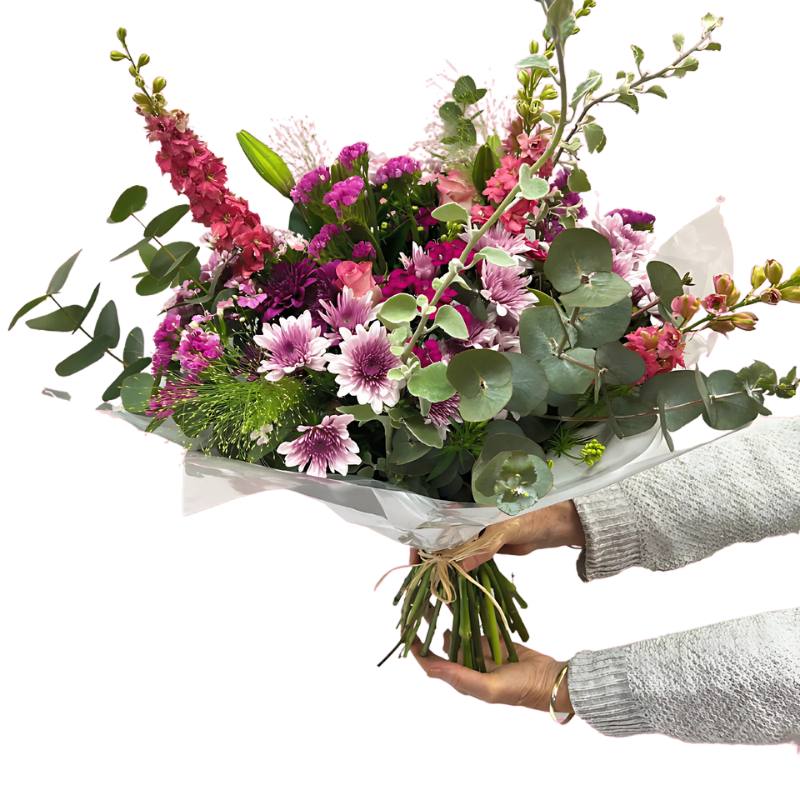 One of a Kind - Flower Guy vibrant bouquet of pink and purple flowers with eucalyptus, hand-tied and wrapped for gifting