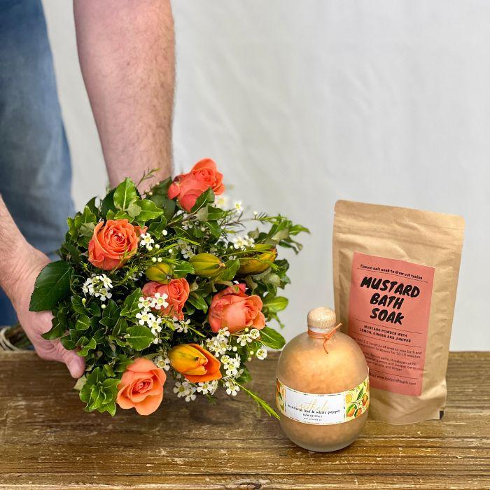 Muscle Bath Soak and White Pepper Bath Crystals Combo with Orange Flower Bouquet roses, lilies and wax flower - Flower Guy