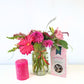 Pink Petal Pleasure floral arrangement with candle and Darling Sweet mint toffees add-on | Flower Guy