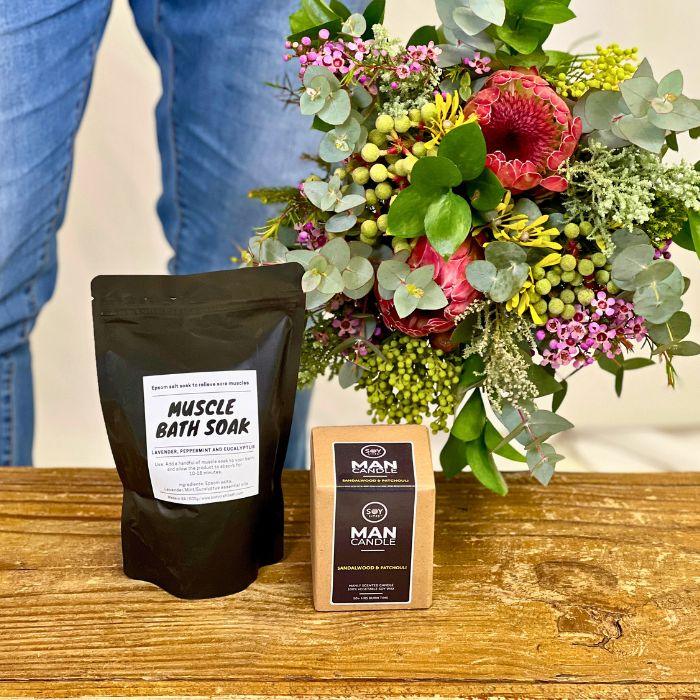 Muscle Bath Soak and SOY Man Candle included in the gift set with the Protea Blooming Bouquet - Flower Guy