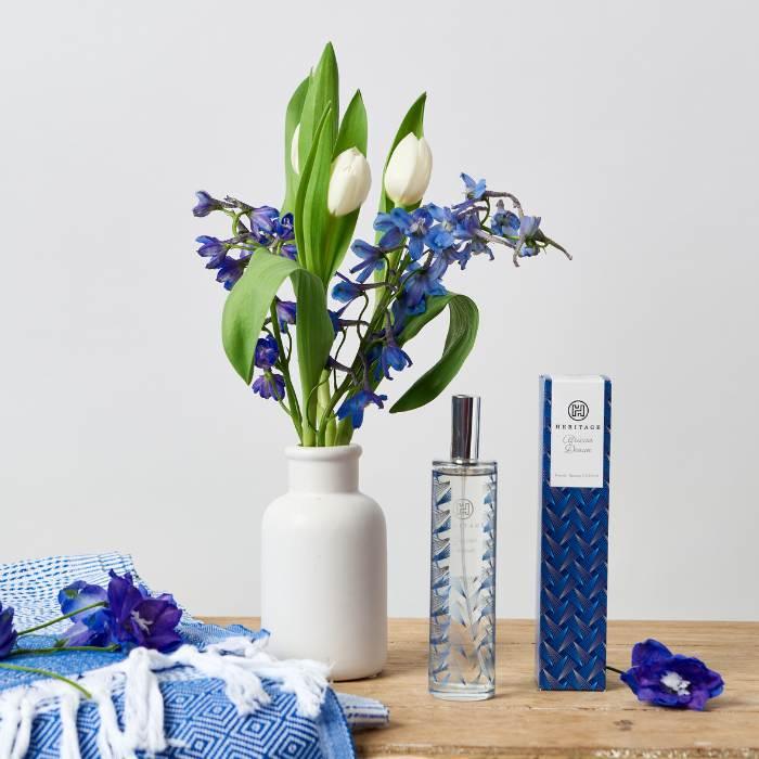 Shweshwe-patterned room spray gift set for ladies with a blue and white cotton throw and a vase of blue and white flowers - Flower Guy