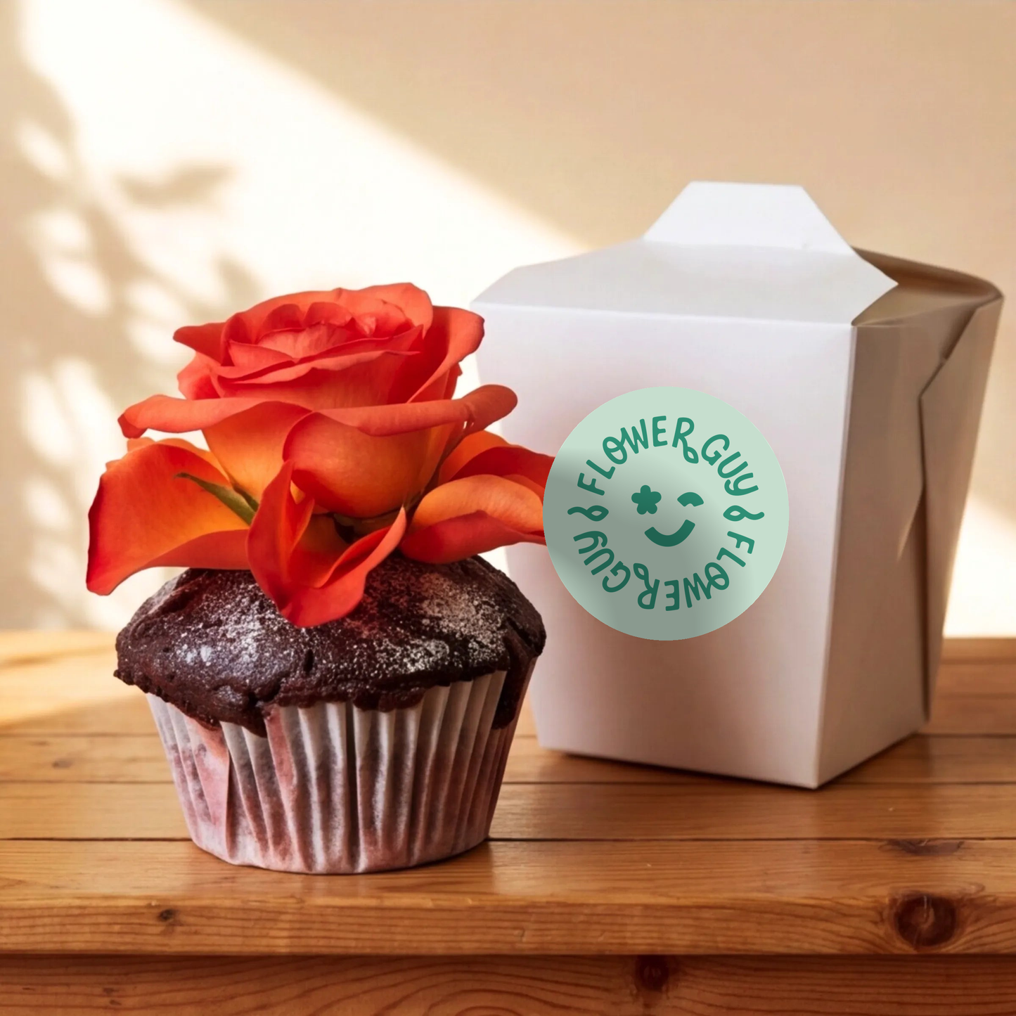 Single chocolate cupcake with orange rose topper paired with its Flower Guy gift box, Cape Town same-day add-on for flowers and gift hampers