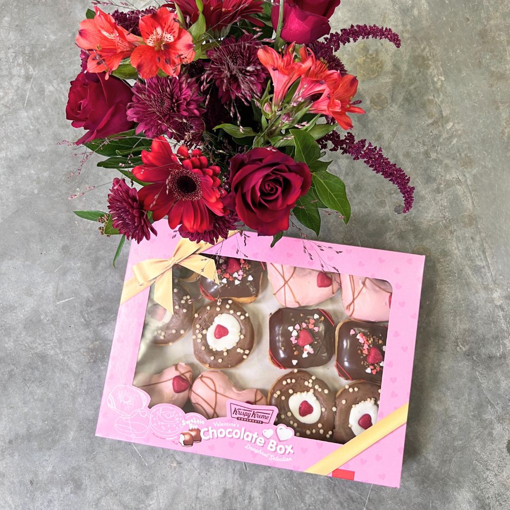 Artisanal Krispy Kreme doughnuts and fresh floral gift by Flower Guy