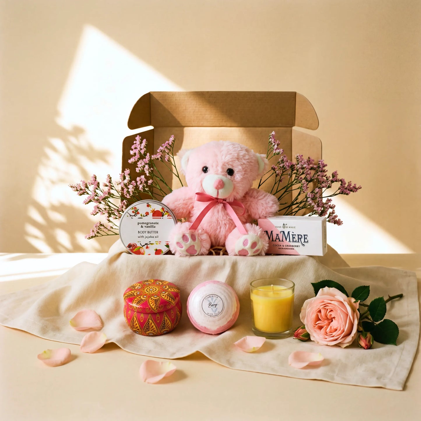 Teddy Comfort Care Box pink teddy bear, pomegranate vanilla body butter, candle and Mamere nougat by Flower Guy