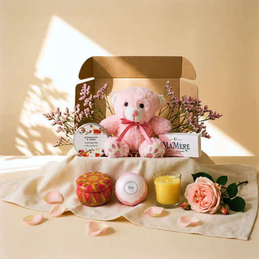 Teddy Comfort Care Box pink teddy bear, pomegranate vanilla body butter, candle and Mamere nougat by Flower Guy